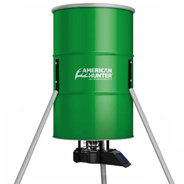 Green american hunter outdoor feeder with tripod legs.