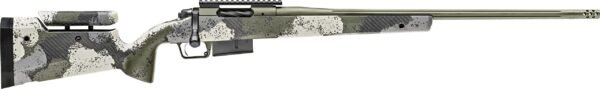 Camouflage bolt-action rifle with a green, white, and gray speckled pattern finish, featuring a textured grip and a fluted barrel.