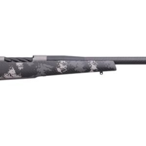 Carbon fiber rifle with a black and gray camouflage stock, featuring a long barrel and perforated muzzle brake.