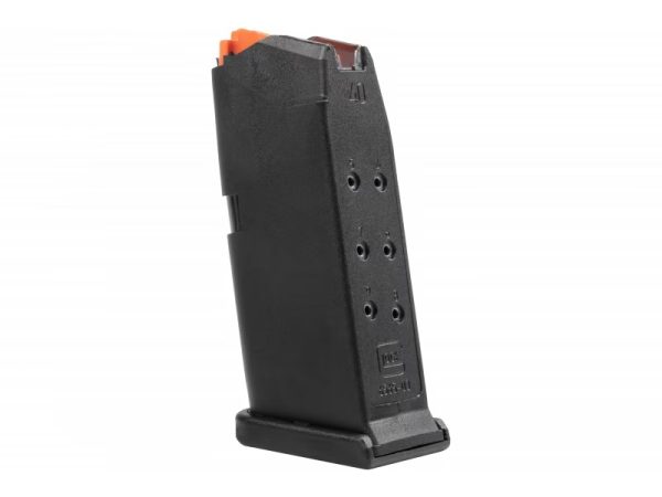 Black firearm magazine with orange follower and round indicator holes, suitable for firearms reference.