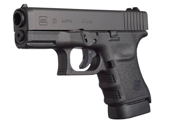 Black semi-automatic pistol with textured grip and matte slide, showcasing the brand and caliber details.