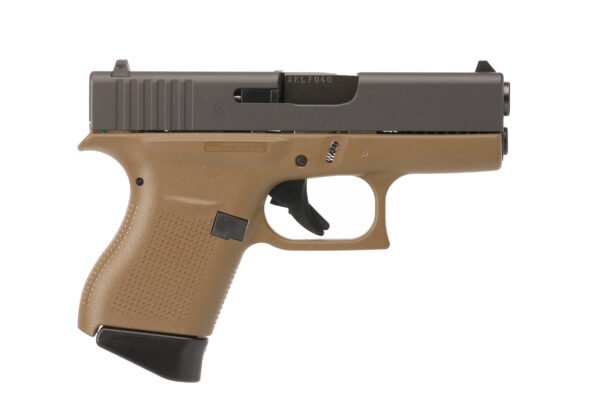 Tan and black handgun with textured grip, showing left profile view.