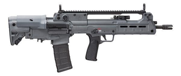 Gray and black firearm with a modern design, featuring a textured black grip, detachable magazine, and rail system for accessories, against a white background.