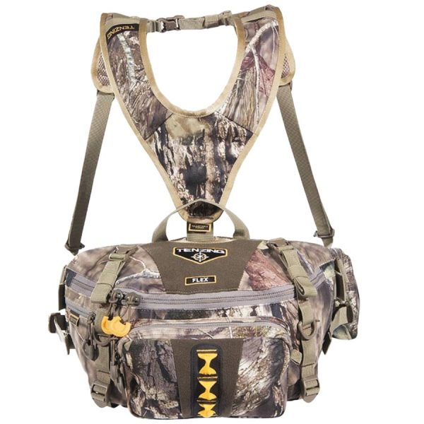 Camo hunting bag with shoulder harness, multiple compartments, and green and brown camouflage design; suitable for firearms and ammunition, product available in casey, iowa.