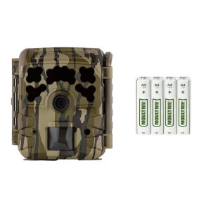 A camouflage wildlife camera with a lens and a compartment for batteries, accompanied by four AA batteries.