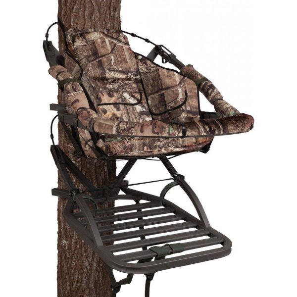 A camouflage hunting tree stand attached to a tree, featuring a comfortable seat and a foot platform.
